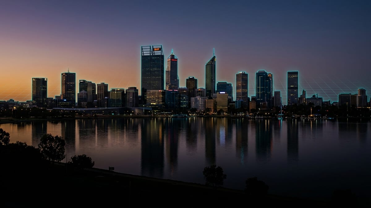 Perth city skyline at dusk with the Swan River in the foreground